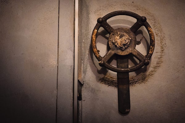 In-game: close-up of a wheel/ door handle.