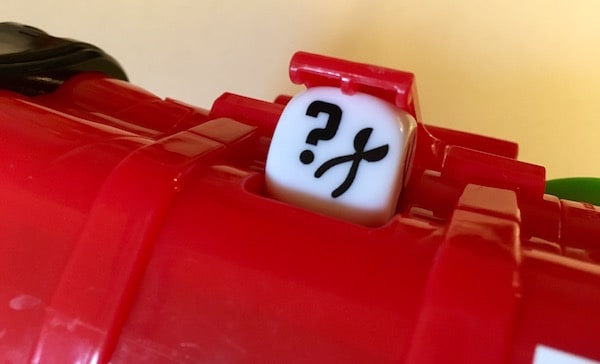 The dice attached to the back of the bomb.