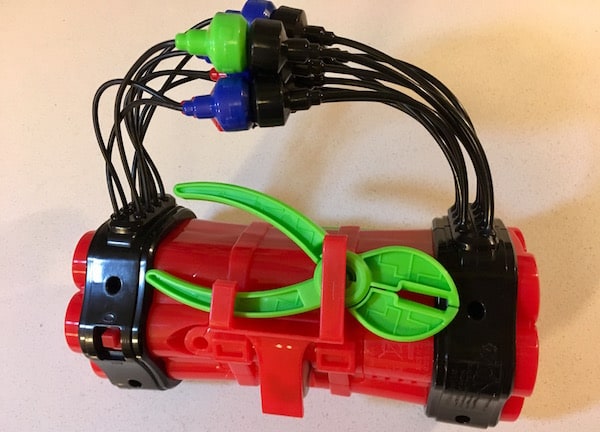 The wirecutters attached to the back of the bomb.