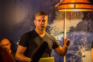 In-experience: show co-creator Ryan Hart speaking to the players.