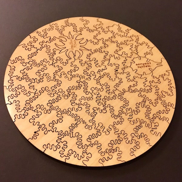 The entire puzzle inverted showing the unusual cut pattern.