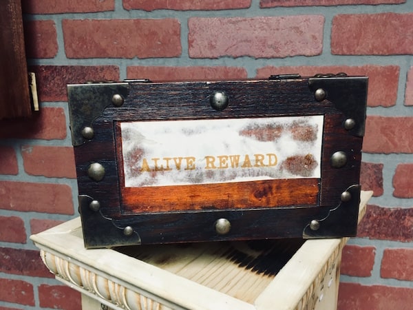 In-game: Closeup of a blow that is labeled "Alive Reward."