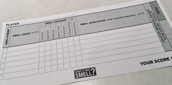 An answer sheet with multiple questions.