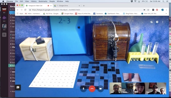 In-game: The game table staged with puzzle components and locked boxes.
