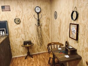 In-game: a wooren room with a small card table.