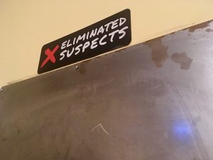 In-game: A steel wall for eliminated suspects.