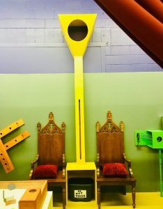 In-game: The score track with a large basket at the top between two thrones.