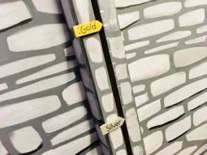 In-game: Closeup of the schore track showing how many points we needed to earn a silver or gold medal.