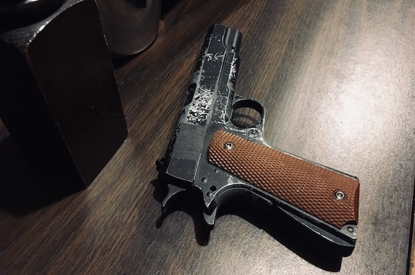 In-game: a worn Colt M1911 pistol.