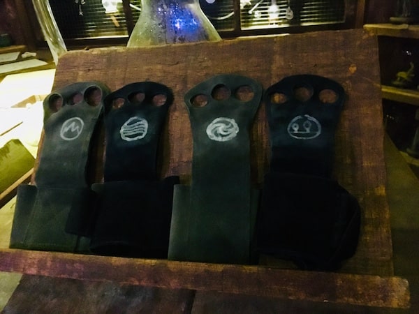 In-game: Magical gloves, each with the symbol of a different elemental magic on it.