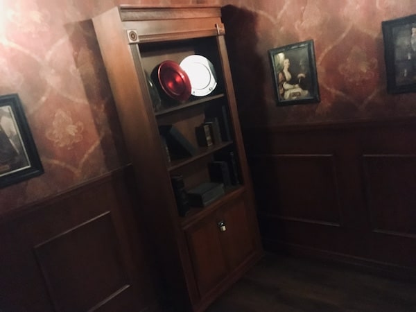 In-game: A bookshelf in an elegant study.