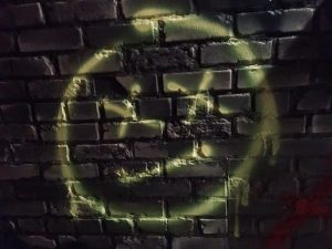 In-game: a grafitti's dead face.