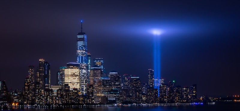 World Trade Center "Tribute in Light" twin towers of light glowing bright in the sky.