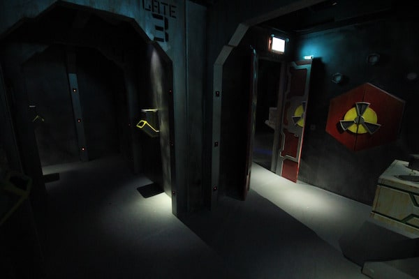 In-game: A series of chambers, a radiation symbol on the wall.