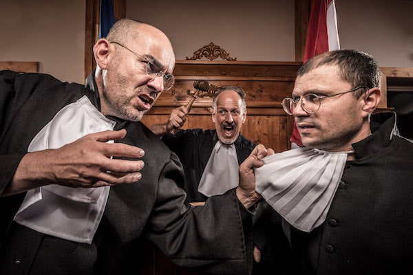 A gleeful judge watching two lawyers physically grabbing one another with anger in their eyes.
