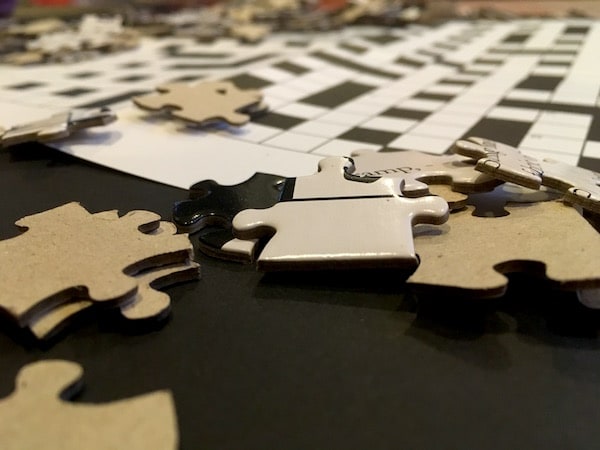 Closeup of loose jigsaw puzzle pieces.