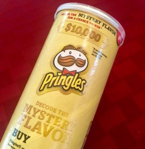 The Pringles logo on the Mystery Flavor Pringles tube.