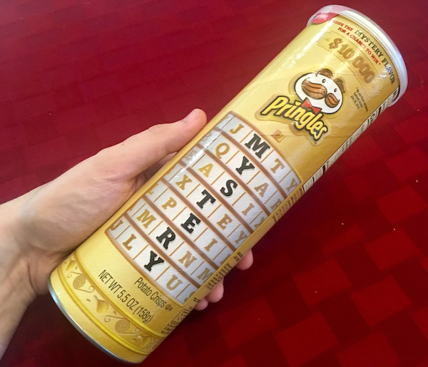The gold Mystery Flavor Pringles tube with a cryptex-like graphic that reads "MYSTERY."