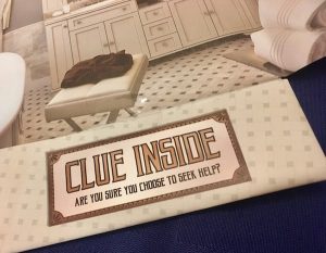 At the bottom of our room is a folded segment labeled "clue inside are you sure you choose to seek help?"