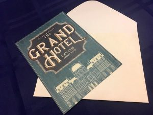An invitation to the reopening of the Grand Hotel.