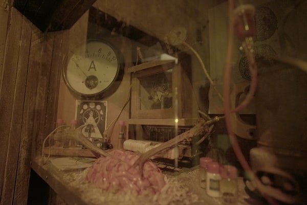 In-game: a brain cooked up to some strange device.