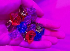 In-game: a handful of multicolored gems.