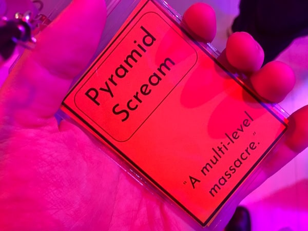 In-game: the character card for "Pyramid Scream." It's subtitled, "A multi-level massacre."