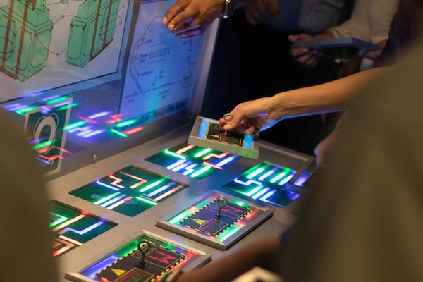 In-game: players solving a beautiful, multi-colored logic puzzle.
