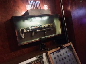 In-game: a large steampunk gun mounted to the wall.