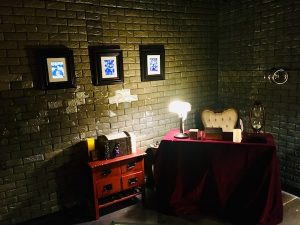 In-game: The wizard's chambers with the desk of the wizard.