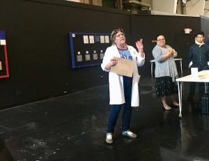 The game's main character in a labcoat and goggles.