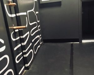 In-game: strange white on black writing on a wall.