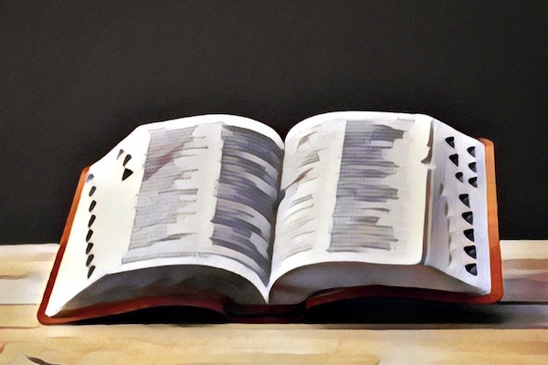 Stylized image of a dictionary open on a table. 