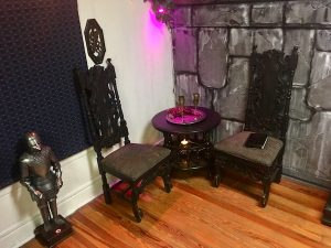 In-game: A small round table with two chairs beside it.