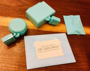 The blue track, 2 locked boxs, a sealed envelope, and a ziplock bag with other mystery components.