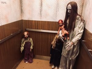 In-game: an elevator with a family of monsters within.