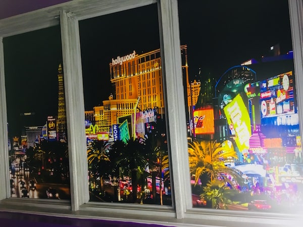 In-game: a view out of a window of the Las Vegas Strip.