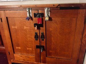 In-game: a cabinent locked with 6 differend padlocks.