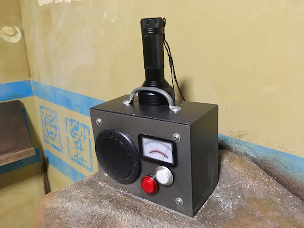 In-game: closeup of a radio and a blacklight.