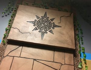 In-game: A sun etched in the wall of the ruins.