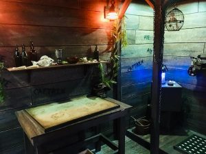 In-game: The inside of the ship, a very large map on a table.