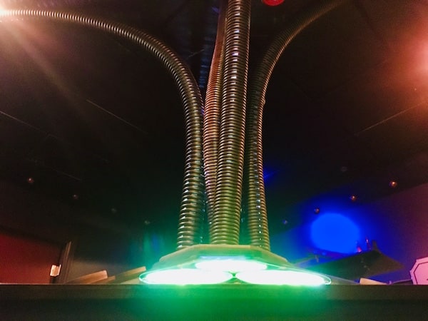 In-game: 4 tubes protruding upwards from a glowing console.