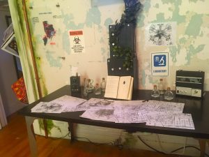 In-game: A lab desk with many notes on it.