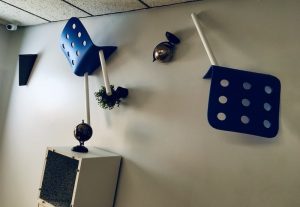 In-game: A wall with furniture stuck within it.