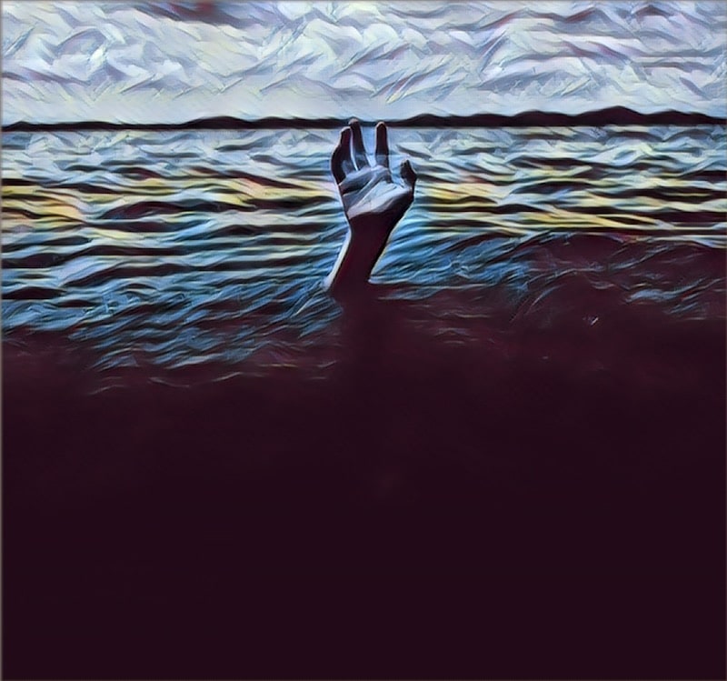A hand reaching up out of dark waters.