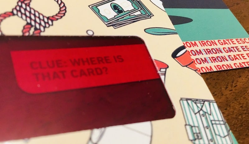 Red fliter revealing, "Clue: Where is that card?"