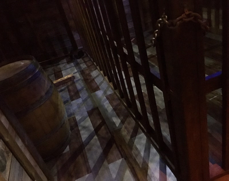 In-game: the brig inside of a wooden ship.