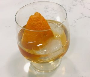 Closeup of an Old Fashion with an orange.