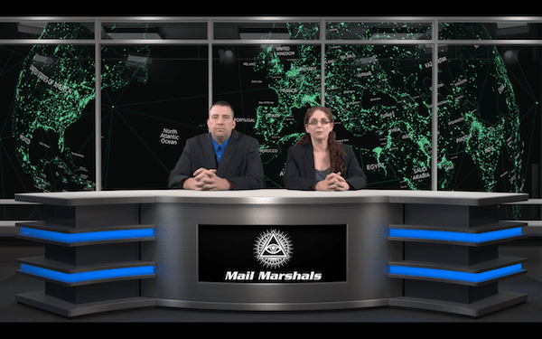 Two agents sit at a desk labeled "Mail Marshals" in front of a giant screen showing a close-up of a globe.