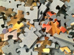 Closeup of Ravensburger puzzle pieces in the box.